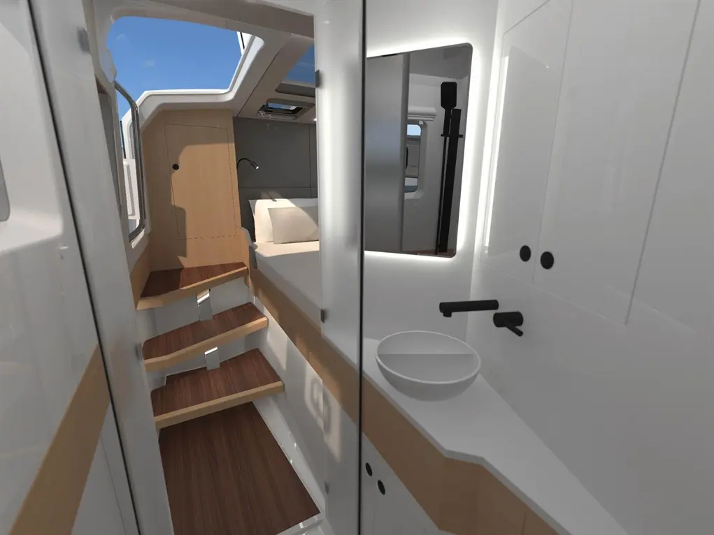 Interior view of a modern boat cabin showing wooden stairs, a small sink, and a mirror, with natural light from the window.